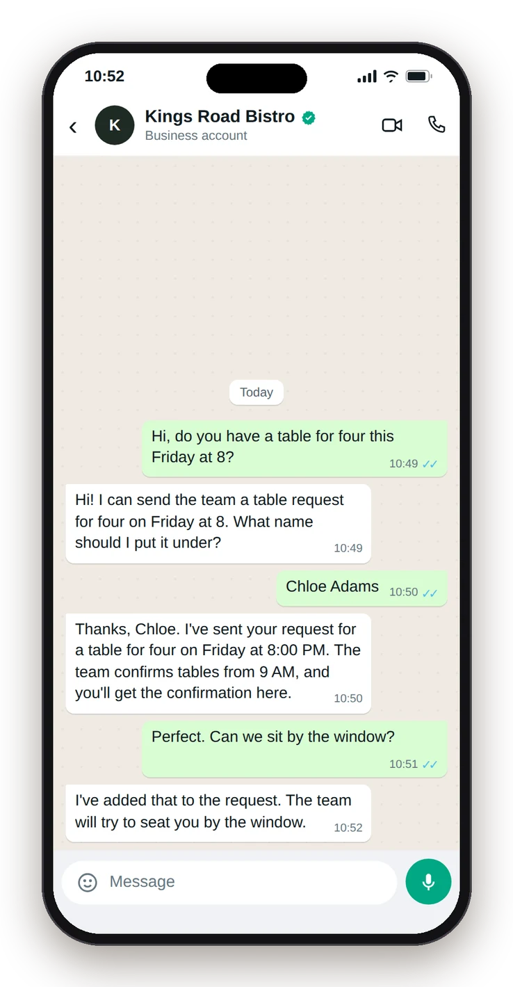 WhatsApp chat with Kings Road Bistro at 10:52 PM: the AI receptionist takes a table request for four on Friday at 8 and adds a window seat